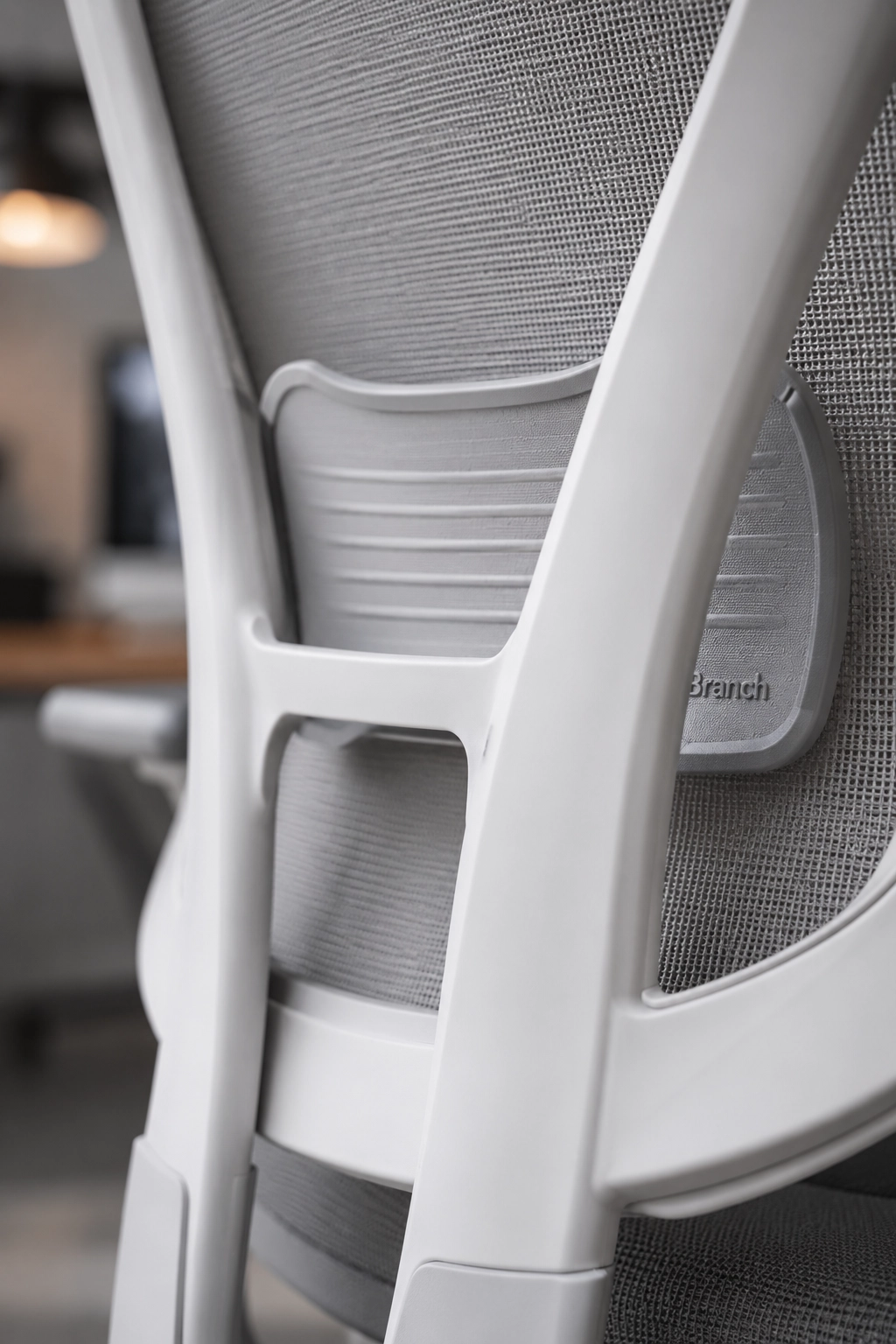 Branch Ergonomic Chair Pro close up view on adjustable lumbar tracking pad