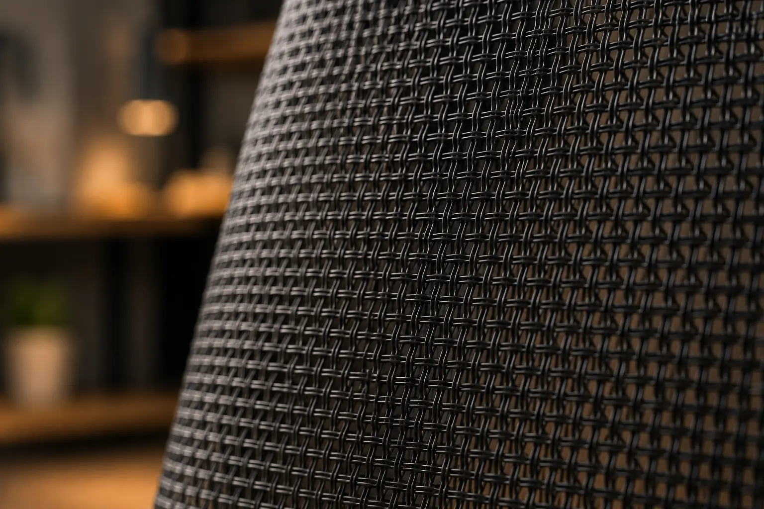 High density molded foam office chair seat cushion wrapped in durable grey fabric upholstery close up
