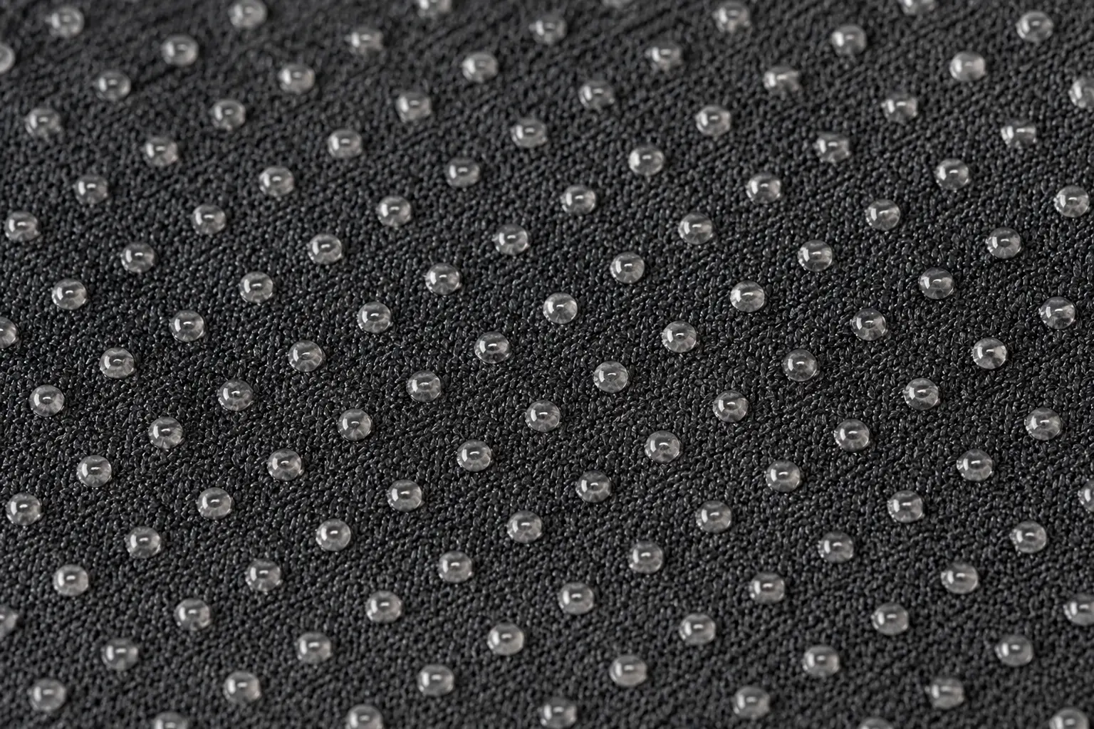 Ergonomic seat cushion non-slip silicone micro dots texture on the bottom cover close up